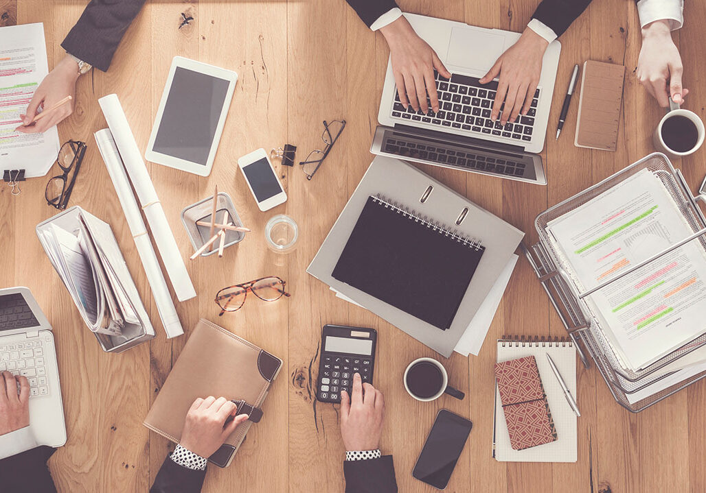 Top view of business people working in office